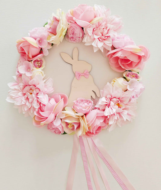 Ghirlanda in legno con fiori rosa