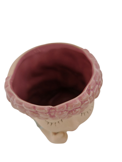 Vaso volto fiori rosa