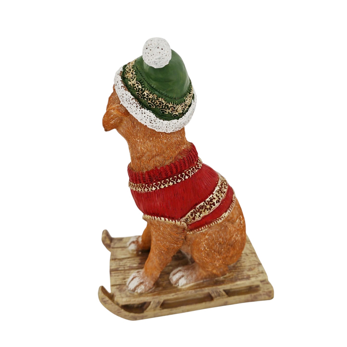 Cagnolino d'appoggio su slitta verde