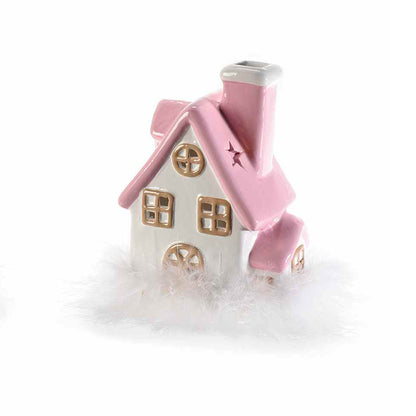 Casetta in ceramica rosa e bianca luminosa